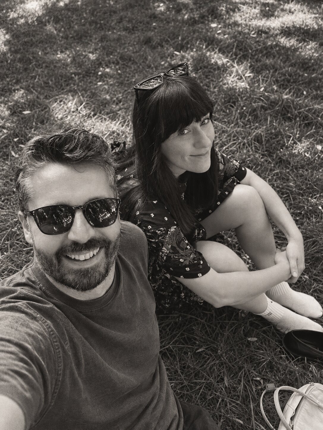 Marko Stanojevic and Ivona Stanojevic, the founders of SINK, sitting on the grass